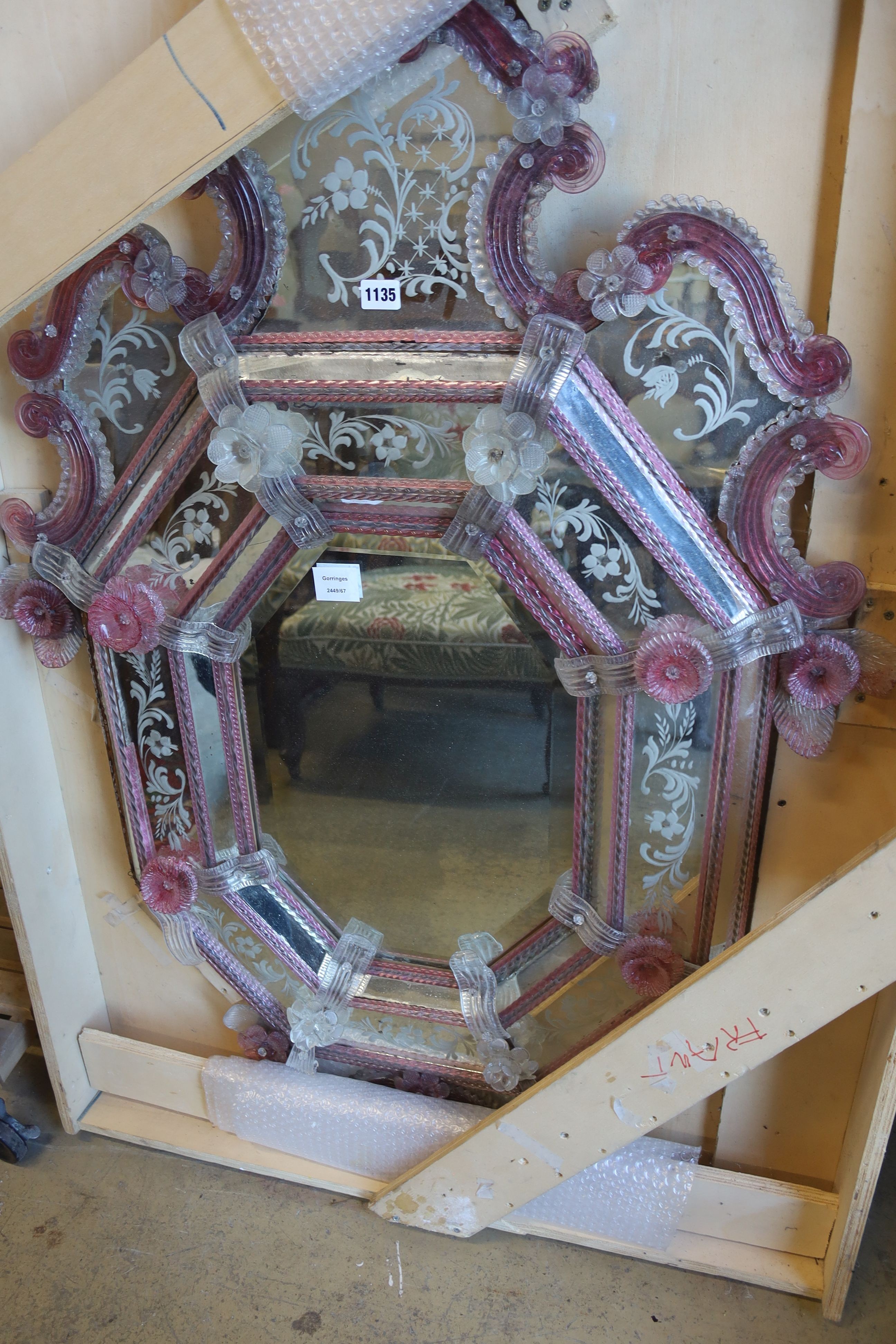 A Venetian etched pink and clear glass wall mirror with octagonal plate, (damage) width 84cm, height 120cm